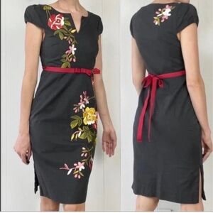 Moulinette Soeurs Black Midi Dress with Floral Accents and Red Sash